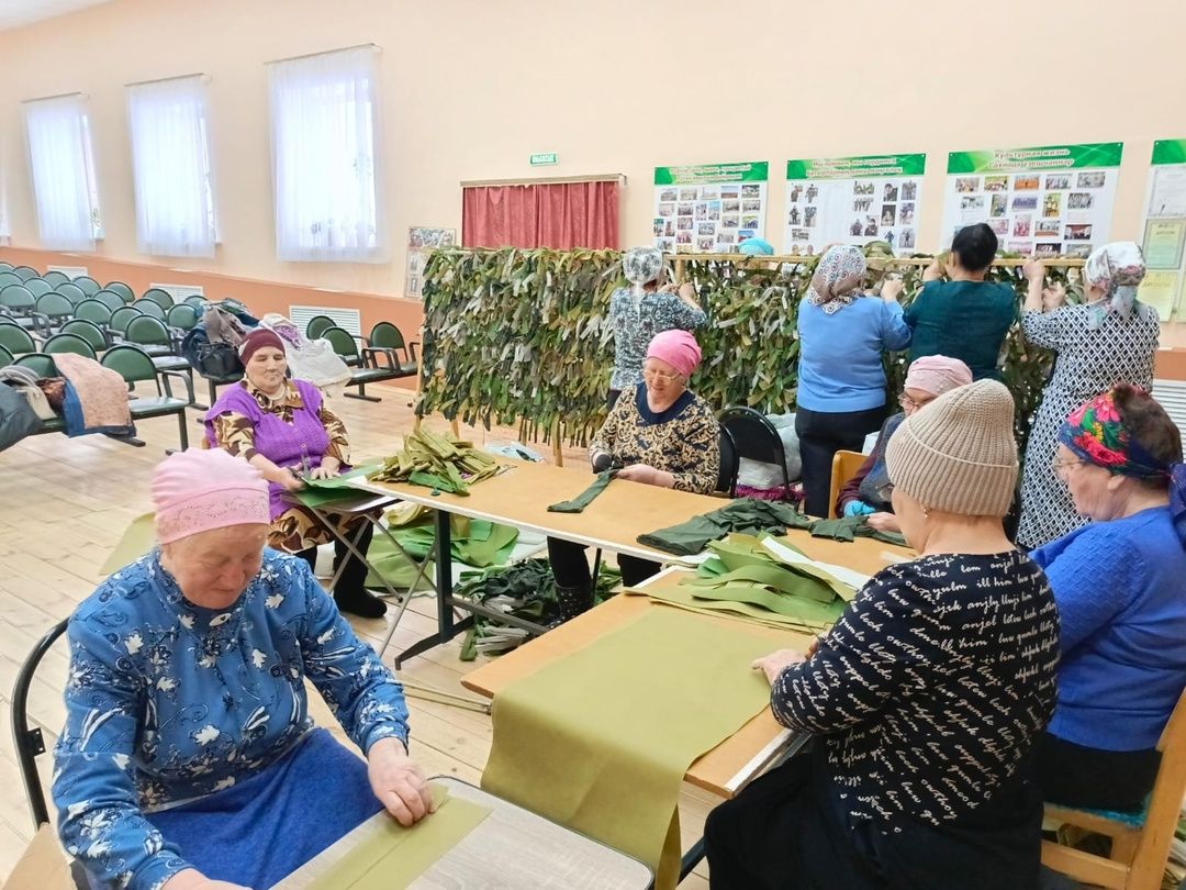 Тепло рук в маскировочной сети