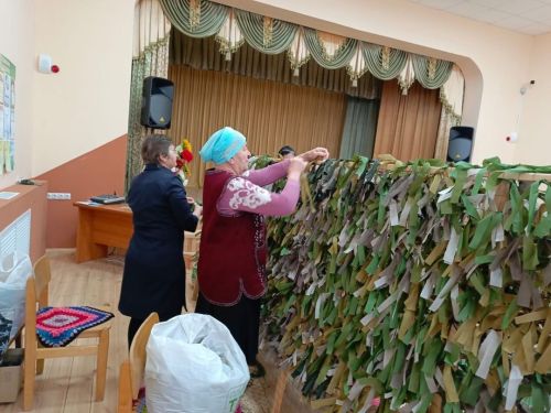 Тепло рук в маскировочной сети