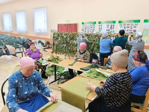 Тепло рук в маскировочной сети